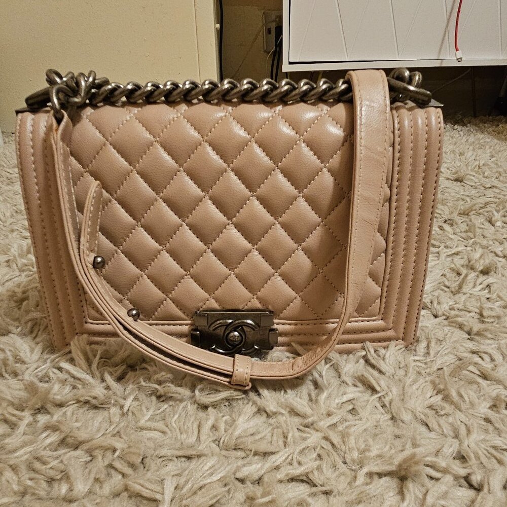 CHANEL Boy FLAP QUILTED PURSE with chain.